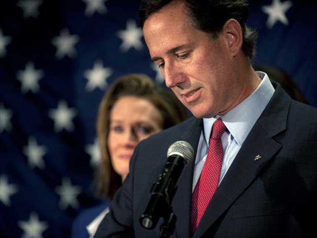 Former Sen. Rick Santorum as he announced the end of his White House bid. His wife, Karen, is in the background.