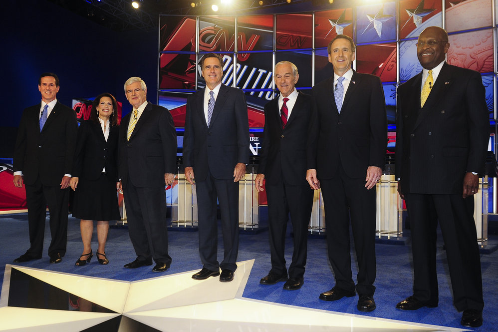 Santorum joins the field of candidates on stage in Manchester, N.H., before a GOP presidential debate on June 13. 