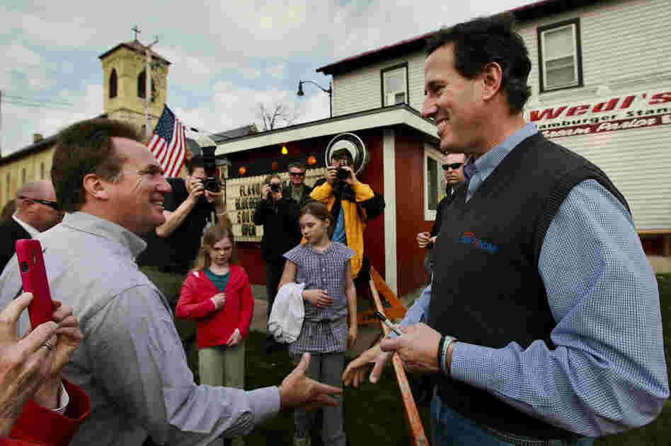 A week before Wisconsin's primary, Santorum chats with Mayor Dale Oppermann in Jefferson, Wis., on March 27. 