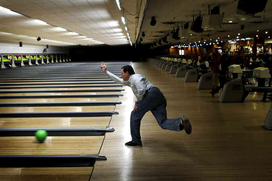 Santorum gets in some bowling at Sabre Lanes in Menasha, Wis., following a campaign rally on April 2. 