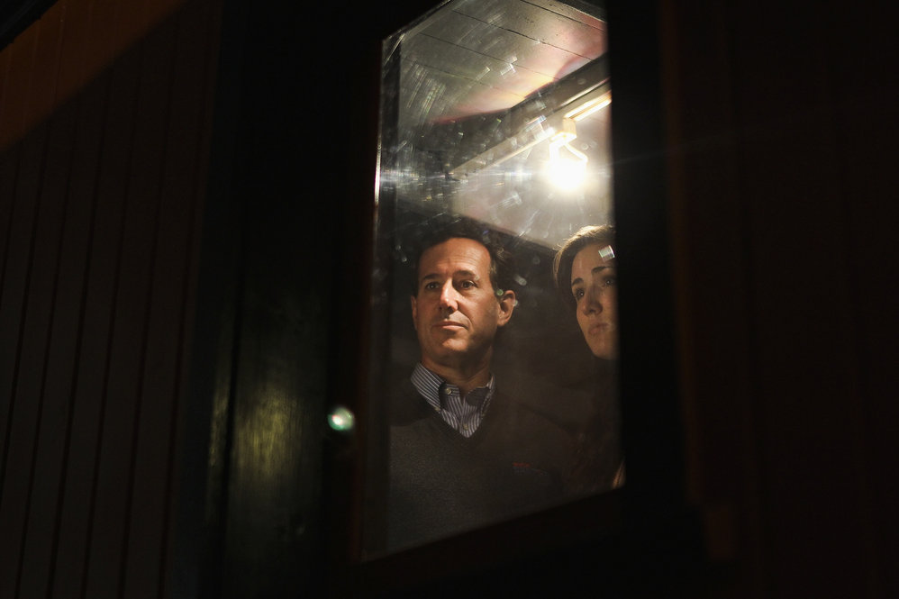 Santorum tours a vintage train car on April 1 in Green Bay, Wis. His loss in Wisconsin led many pundits to declare his campaign over. 