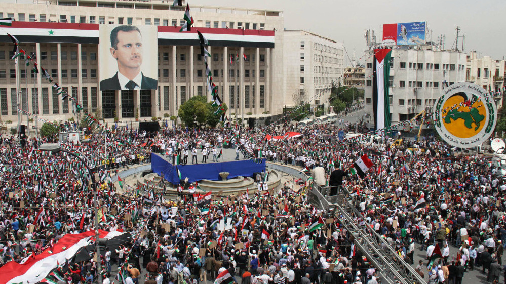 Syrian President Bashar Assad was supposed to pull the military out of cities by Tuesday, but more attacks were reported. Some Syrians rallied in support of Assad and his Baath Party in the capital, Damascus, on Saturday.