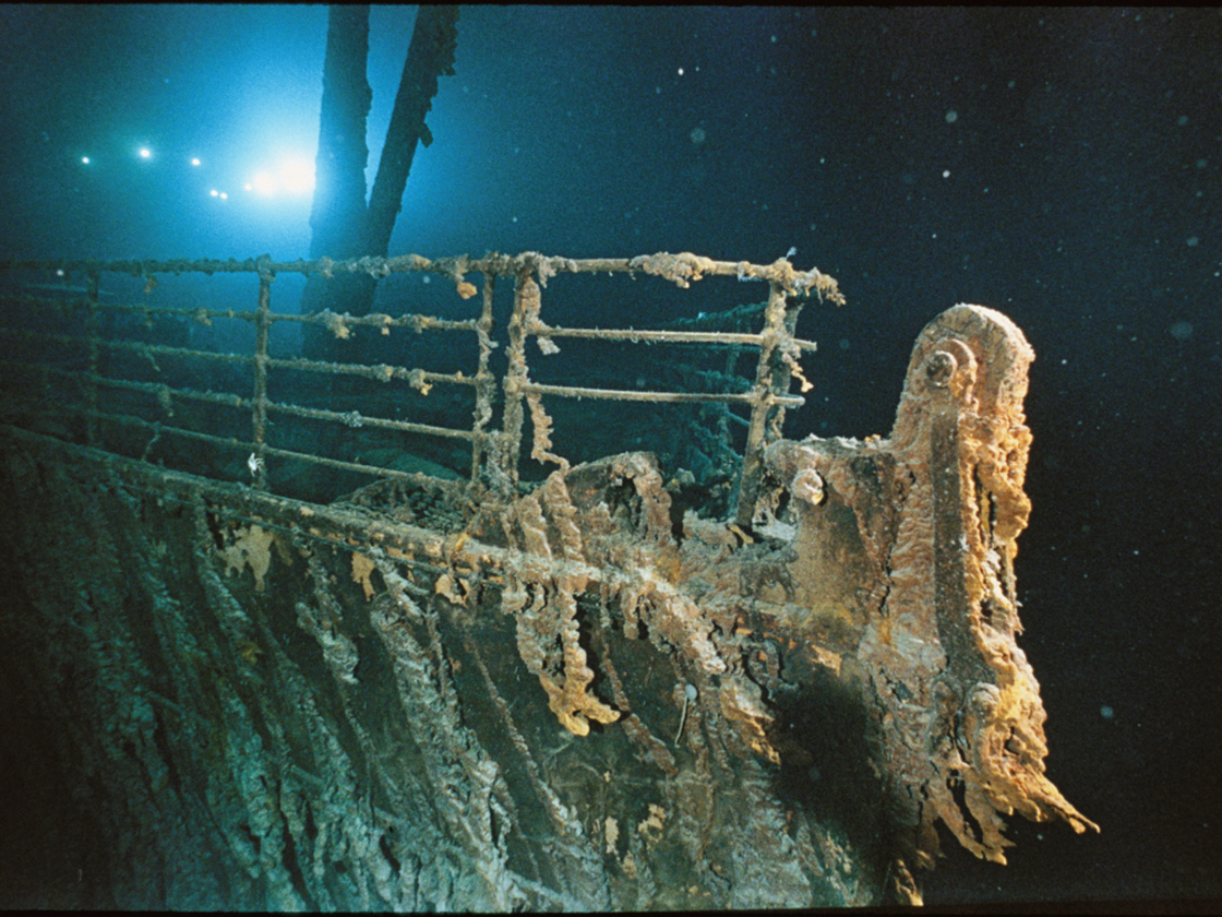 The bow railing of RMS Titanic, illuminated by the Mir 1 submersible. Read more about the wreck in a National Geographic report.