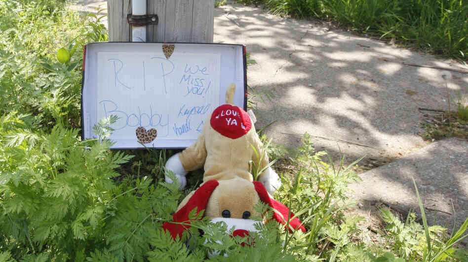 A makeshift memorial pays tribute to Bobby Clark, one of the victims of a shooting spree that left three people dead and terrorized Tulsa's African-American community. A makeshift memorial pays tribute to Bobby Clark, one of the victims of a shooting spree that left three people dead and terrorized Tulsa's African-American community.