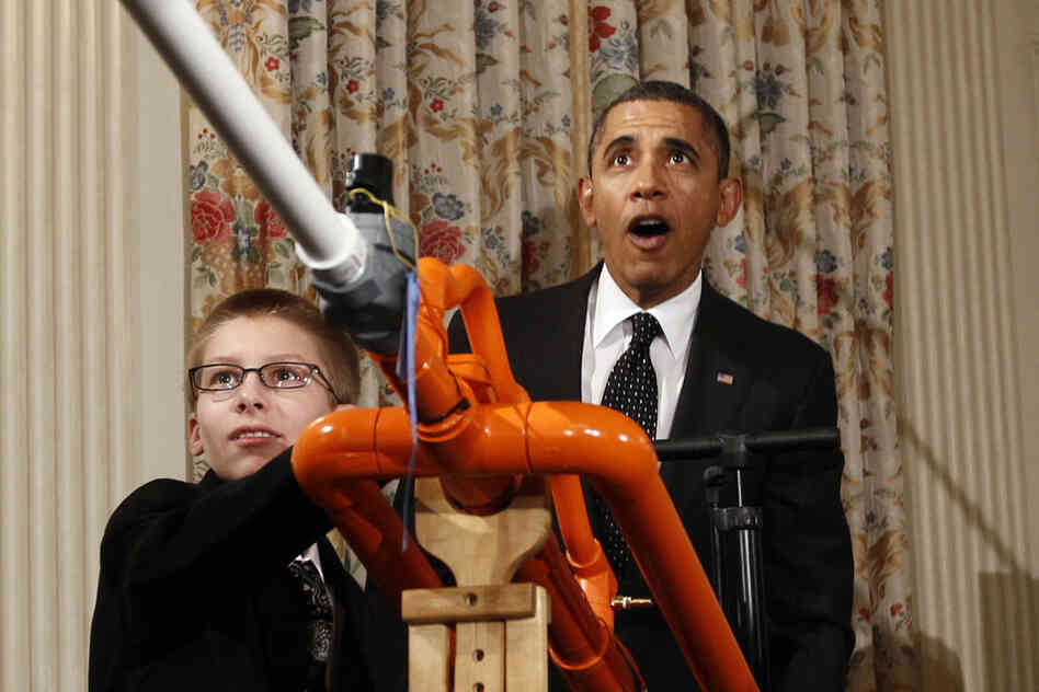 Blinded By Science: President Obama watches Joey Hudy fire his Extreme Marshmallow Cannon at the 2012 White House Science Fair. 