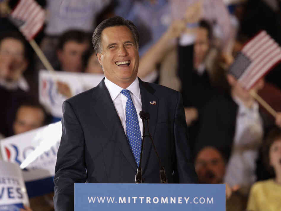 Former Massachusetts Gov. Mitt Romney laughs while addressing supporters at his Super Tuesday campaign rally in Boston on March 6.