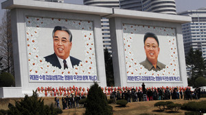 Mosaics of the two late North Korean leaders — Kim Jong Il (right) and Kim Il Sung, the country's founder — are unveiled Monday during celebrations marking the 100th anniversary of Kim Il Sung's birth, in Pyongyang, North Korea.