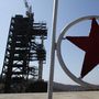 A North Korean soldier stands guard in front of the Unha-3 (Milky Way 3) rocket on a launchpad at the West Sea Satellite Launch Site, during a guided media tour by North Korean authorities northwest of Pyongyang on April 8. 