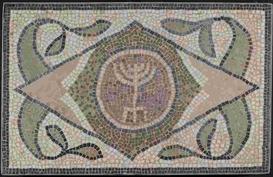 This mosaic is of a menorah from a sixth-century synagogue in Tunisia, a time when Jewish communities prospered in the region. 