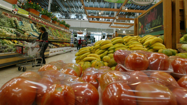 A woman looks over vegetables in Carulla Supermarket in Bogota, Colombia. The country, which plays host this weekend to the Summit of the Americas, is a rising star in the region. Foreign investment has quadrupled over the past decade, and it has a new free-trade agreement with the U.S. A woman looks over vegetables in Carulla Supermarket in Bogota, Colombia. The country, which plays host this weekend to the Summit of the Americas, is a rising star in the region. Foreign investment has quadrupled over the past decade, and it has a new free-trade agreement with the U.S.