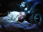 In a production of Verdi's opera Rigoletto at the Sydney Opera House, the title character (baritone Jonathan Summers) reels at the discovery of his dead daughter. In a production of Verdi's opera Rigoletto at the Sydney Opera House, the title character (baritone Jonathan Summers) reels at the discovery of his dead daughter.