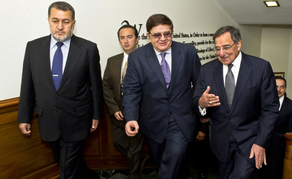 Secretary of Defense Leon E. Panetta, far right, escorts Afghanistan's Minister of National Defense Abdul Rahim Wardak (center) and Minister of Interior Gen. Bismillah Khan Mohammadi (left) in the Pentagon.