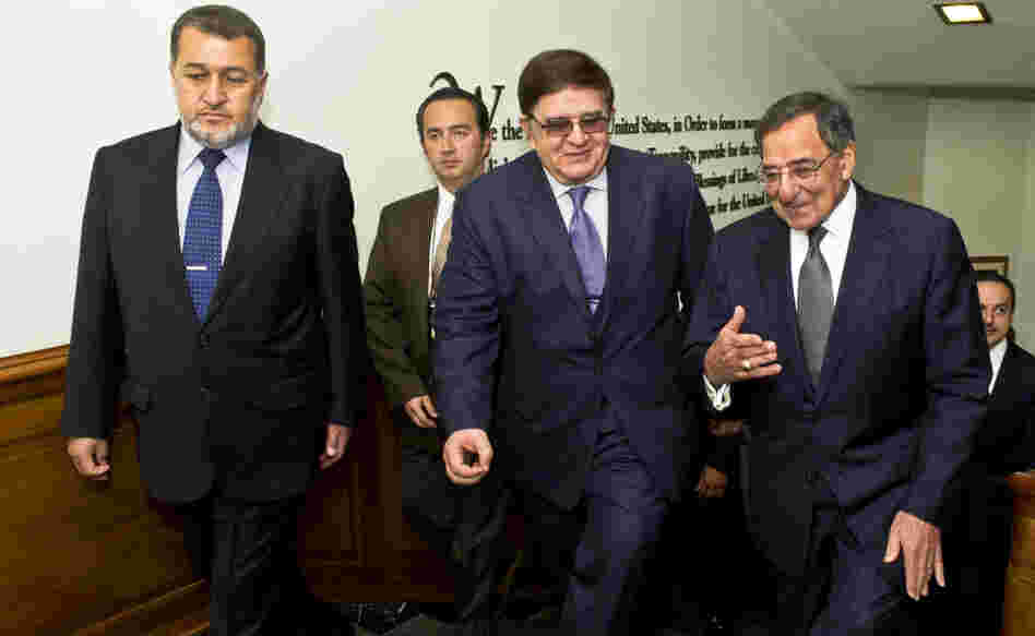 Secretary of Defense Leon E. Panetta, far right, escorts Afghanistan's Minister of National Defense Abdul Rahim Wardak (center) and Minister of Interior Gen. Bismillah Khan Mohammadi (left) in the Pentagon.