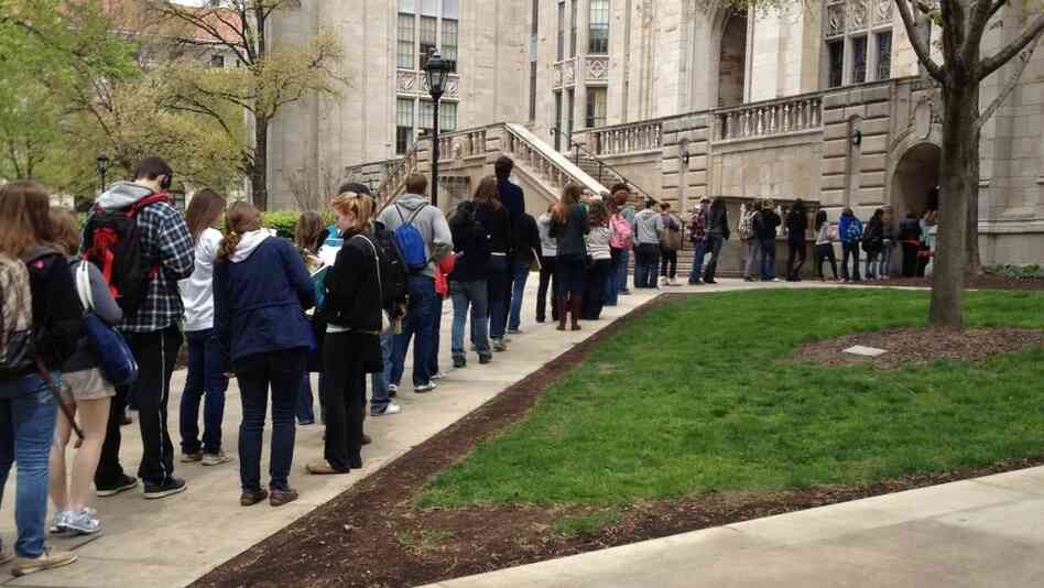 Students wait to pass through a security checkpoint at the University of Pittsburgh's Cathedral of Learning on Tuesday. Security has tightened at the school after a string of false bomb threats on the campus. Students wait to pass through a security checkpoint at the University of Pittsburgh's Cathedral of Learning on Tuesday. Security has tightened at the school after a string of false bomb threats on the campus.