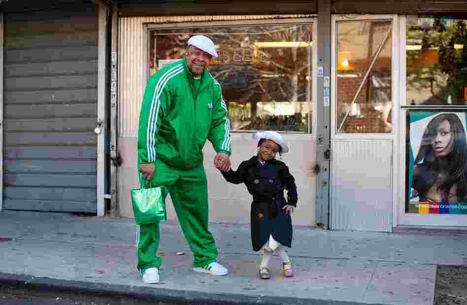 "Andre had just gotten Essence's Easter photo taken and was walking home when I met them. Andre, 40, is a former addict who has been in recovery for 12 years." "Andre had just gotten Essence's Easter photo taken and was walking home when I met them. Andre, 40, is a former addict who has been in recovery for 12 years."
