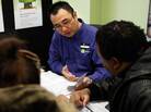 In this Friday, Jan. 6, 2012 photo, Tai Sung, a master tax advisor for H&R Block, center, consults with clients about their taxes at his office in Rockville, Md. In our second hour, listeners talk about the lessons they've learned over years of filing. In this Friday, Jan. 6, 2012 photo, Tai Sung, a master tax advisor for H&R Block, center, consults with clients about their taxes at his office in Rockville, Md. In our second hour, listeners talk about the lessons they've learned over years of filing.