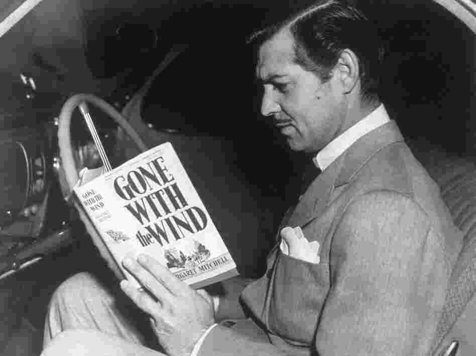 Margaret Mitchell's Gone with the Wind was at the center of Depression-era price-fixing controversies. Here, Clark Gable prepares for his role as Rhett Butler in the MGM film adaptation.