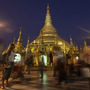 A foreigner pauses to look at the glittering Shwedagon Pagoda, a famous landmark in Myanmar, in Yangon in February. The country's tourism industry is racing to keep up with the rush of visitors now that Myanmar is opening to the outside world.