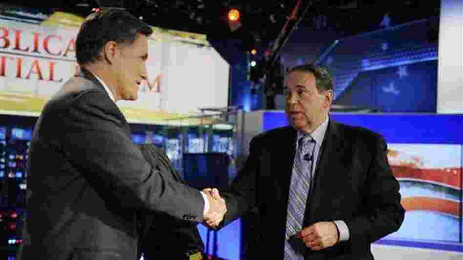 Running mates? Mitt Romney greets former Gov. Mike Huckabee after taking part in a Republican presidential forum on Huckabee's Fox News program on Dec. 3, 2011. Running mates? Mitt Romney greets former Gov. Mike Huckabee after taking part in a Republican presidential forum on Huckabee's Fox News program on Dec. 3, 2011.