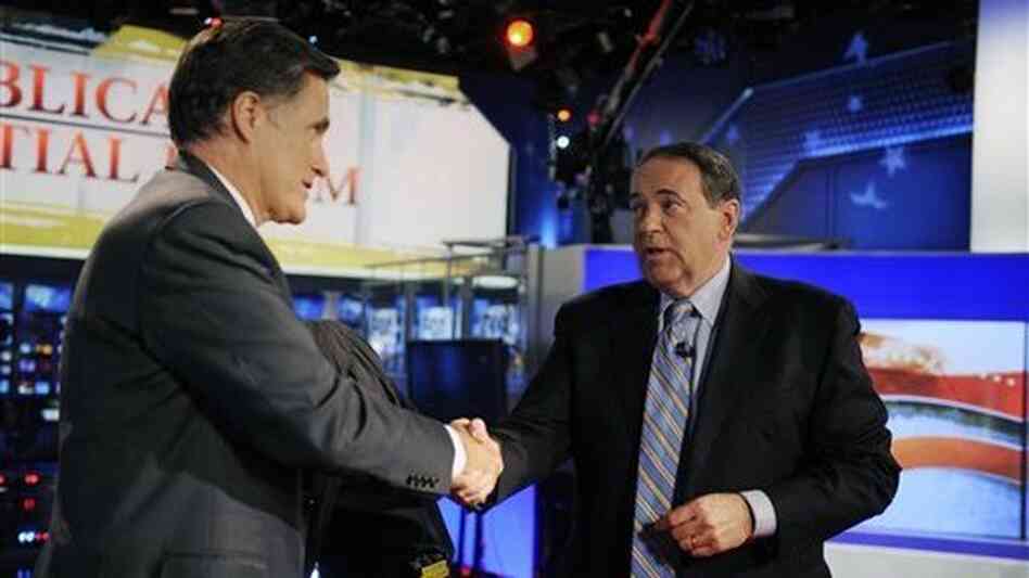 Running mates? Mitt Romney greets former Gov. Mike Huckabee after taking part in a Republican presidential forum on Huckabee's Fox News program on Dec. 3, 2011. Running mates? Mitt Romney greets former Gov. Mike Huckabee after taking part in a Republican presidential forum on Huckabee's Fox News program on Dec. 3, 2011.