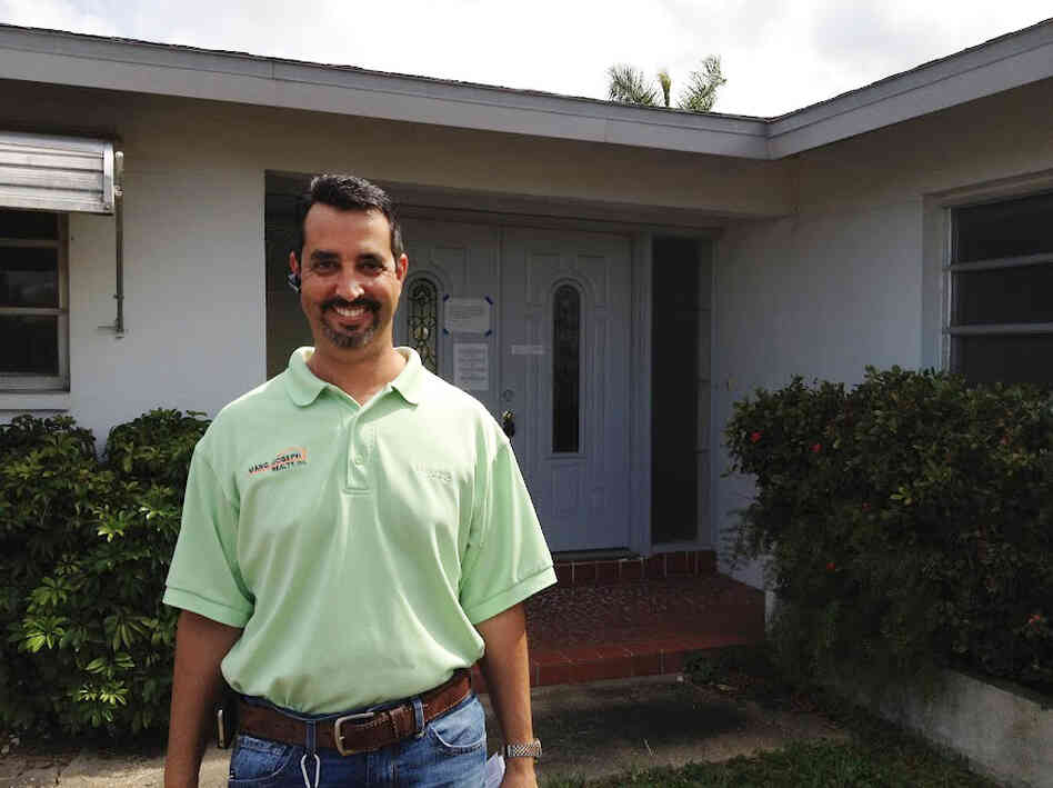 Marc Joseph, a real estate agent, checks on homes that have been foreclosed on. Marc Joseph, a real estate agent, checks on homes that have been foreclosed on.