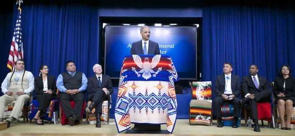 Attorney General Eric Holder announces a $1.023 billion settlement of lawsuits filed by 41 American Indian tribes. Attorney General Eric Holder announces a $1.023 billion settlement of lawsuits filed by 41 American Indian tribes.