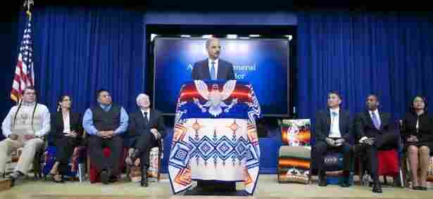 Attorney General Eric Holder announces a $1.023 billion settlement of lawsuits filed by 41 American Indian tribes. Attorney General Eric Holder announces a $1.023 billion settlement of lawsuits filed by 41 American Indian tribes.