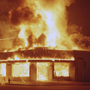A store burns during the Los Angeles riots in April 1992. Three colleagues at a local radio station watched the riots from their studio on Crenshaw Boulevard, as listeners called in to share their own stories. A store burns during the Los Angeles riots in April 1992. Three colleagues at a local radio station watched the riots from their studio on Crenshaw Boulevard, as listeners called in to share their own stories.
