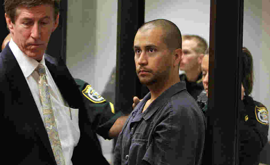 Defense attorney Mark O'Mara (left) stands with his client, George Zimmerman, at a hearing related to second-degree murder charges in the killing of Trayvon Martin in Sanford, Fla.