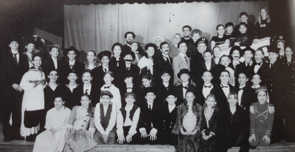 The cast and crew of Titanic, as pictured in my 2001-2002 yearbook. I'm standing in the third row back on the right side, in front of the "captain."
