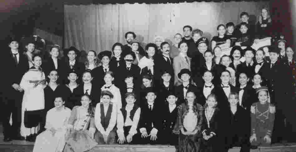 The cast and crew of Titanic, as pictured in my 2001-2002 yearbook. I'm standing in the third row back on the right side, in front of the "captain."