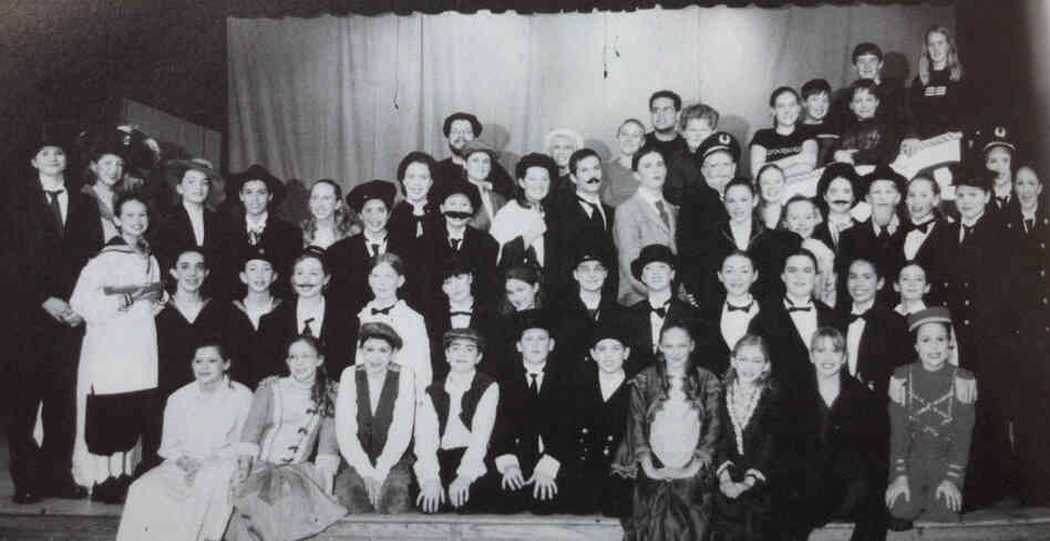 The cast and crew of Titanic, as pictured in my 2001-2002 yearbook. I'm standing in the third row back on the right side, in front of the "captain."