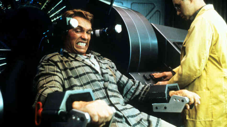 Who Will You Be In 2080? In Paul Verhoeven's movie Total Recall, set in 2084, some people are able to control — and reprogram — other people's memories, to the point that Arnold Schwarzenegger's character does not know exactly who he is. Or whether he is really on Earth or Mars. Who Will You Be In 2080? In Paul Verhoeven's movie Total Recall, set in 2084, some people are able to control — and reprogram — other people's memories, to the point that Arnold Schwarzenegger's character does not know exactly who he is. Or whether he is really on Earth or Mars.