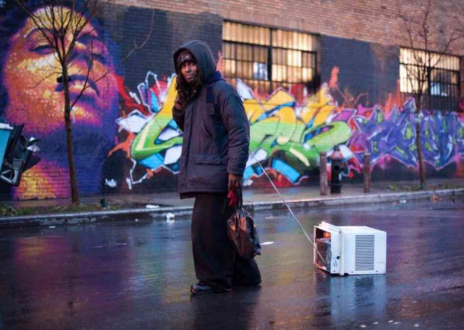 "Homeless since being released from jail ... [Prince] spends the night collecting scrap metal and old pallets that he cashes in before sunrise. He uses the money mostly for heroin, an addiction that has landed him in prison three times. From the Virgin Islands but raised in the Bronx, he is the oldest of 17 children. He was molested by a neighbor as a child, something he is only now understandi...