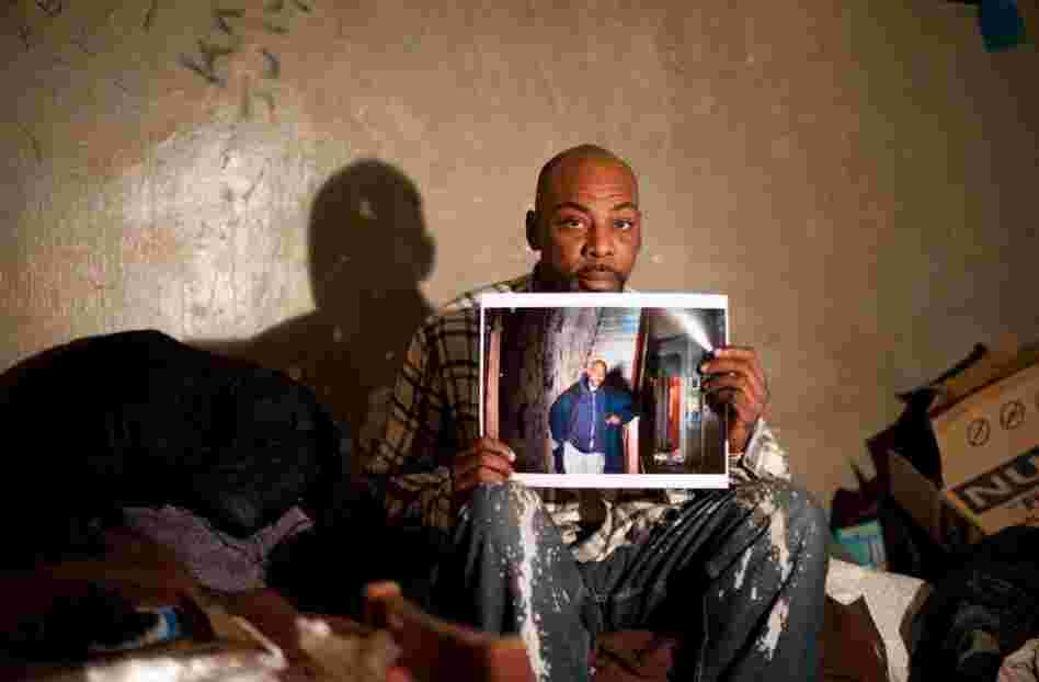 "I returned late Thursday night to give Lamar his picture. Lamar who lives in a small room in an abandoned building, apologized for the mess, then thanked me and asked if I could bring another for his mother."
