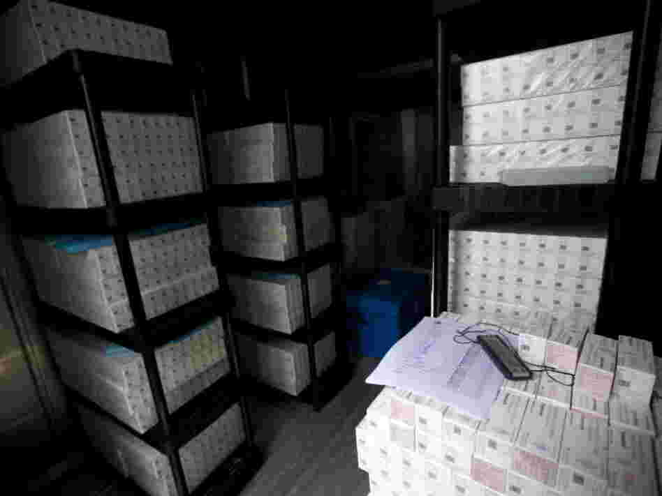 Thousands of doses of cholera vaccine sit in a refrigerated trailer in a United Nations compound in Saint-Marc, Haiti. Thousands of doses of cholera vaccine sit in a refrigerated trailer in a United Nations compound in Saint-Marc, Haiti.