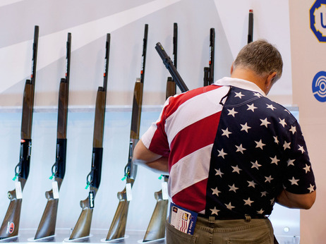 Chris Patrie looks at the Benelli display of shotguns during the NRA annual meetings and exhibits Friday in St. Louis. Chris Patrie looks at the Benelli display of shotguns during the NRA annual meetings and exhibits Friday in St. Louis.