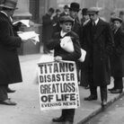 A London newspaper boy sells copies of the Evening News with a story about the sunken ship. A London newspaper boy sells copies of the Evening News with a story about the sunken ship.