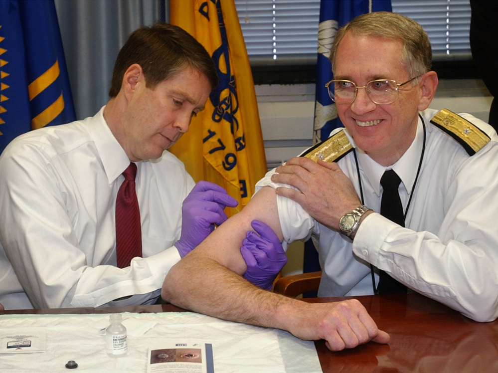 Sen. Bill Frist (left) gives a mock smallpox vaccine during a training session in 2003. Frist, a surgeon, once gave CPR to a visitor who collapsed in a Senate office building. 