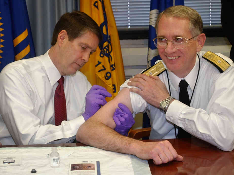 Sen. Bill Frist (left) gives a mock smallpox vaccine during a training session in 2003. Frist, a surgeon, once gave CPR to a visitor who collapsed in a Senate office building. 