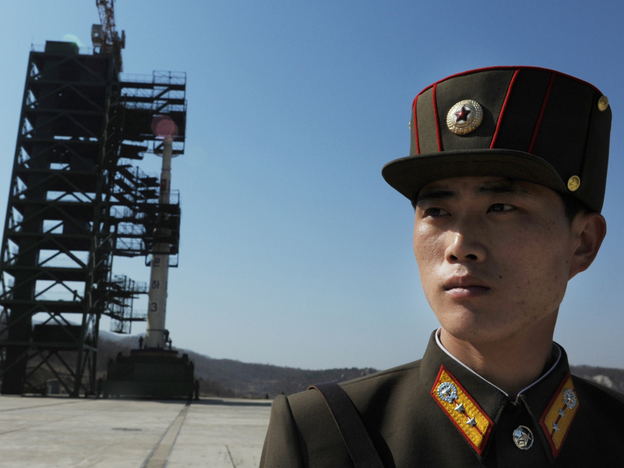 Prior to today's launch, a North Korean soldier stood guard. 