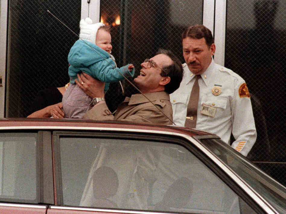William Stern holds his daughter, then known as Baby M, in 1987. The Sterns' surrogate tried to keep the baby after she was born. Their court battle became the first public debate about surrogacy.