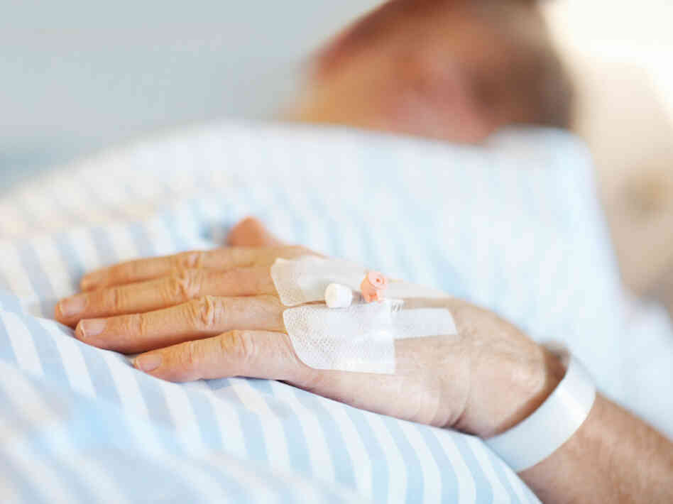Patient lying on a bed.