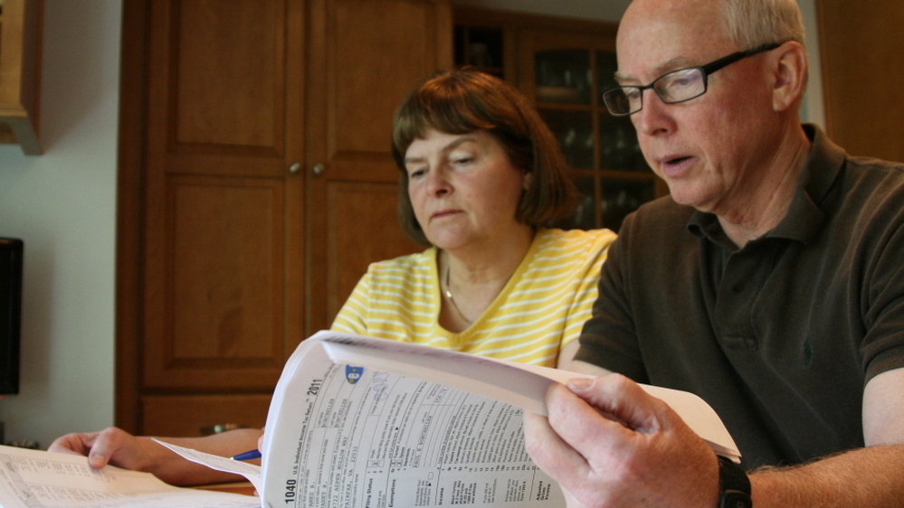 Jim and Janet Borcheller of Fairfax, Via., are in the top 10 percent of income earners. But last year, they had to withdraw money from their retirement account to pay their taxes.