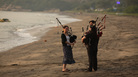 Women practicing bagpipes on a beach in Hong Kong, where the instrument has gained a loyal following. (File photo from October 2011) Women practicing bagpipes on a beach in Hong Kong, where the instrument has gained a loyal following. (File photo from October 2011)
