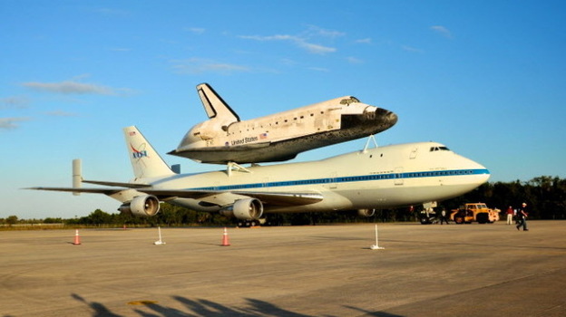Discovery is sitting atop NASA's 747 Shuttle Carrier Aircraft, which will fly the shuttle from Florida to Virginia.