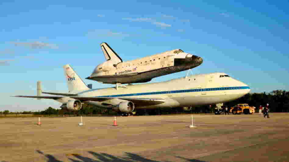 Discovery is sitting atop NASA's 747 Shuttle Carrier Aircraft, which will fly the shuttle from Florida to Virginia.