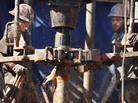 Oil field workers drill into the Gypsum Hills near Medicine Lodge, Kan. Hydraulic fracturing, or "fracking," to coax out oil and gas has led to a natural gas boom that the U.S. market is having trouble absorbing. Oil field workers drill into the Gypsum Hills near Medicine Lodge, Kan. Hydraulic fracturing, or "fracking," to coax out oil and gas has led to a natural gas boom that the U.S. market is having trouble absorbing.