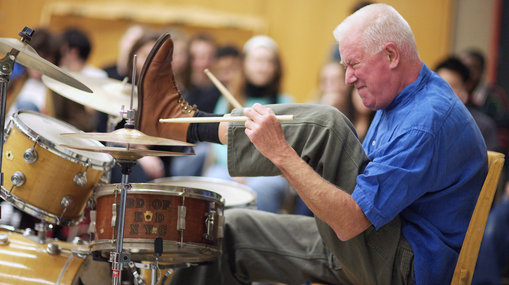 Han Bennink drums on whatever surface he can find — and plays with tone and rhythm while manipulating the drum with parts of his own body.