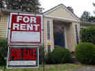 This Sept. 13, 2011, photo shows a house for rent and for sale sign in front of a home in Portland, Ore. In our second hour, NPR's Chris Arnold gives an update on the state of housing markets across the nation.